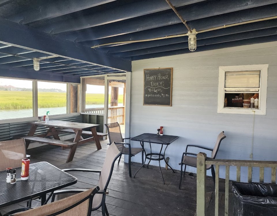 Waterfront dining room with wide harbor views.