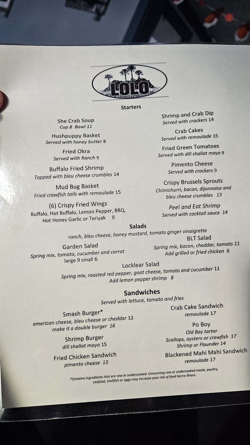 Menu page for seafood and sandwich selections.