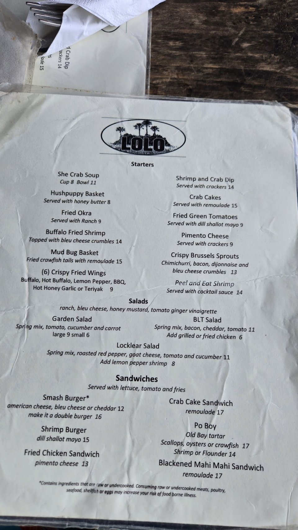 Printed menu for a casual seafood meal.